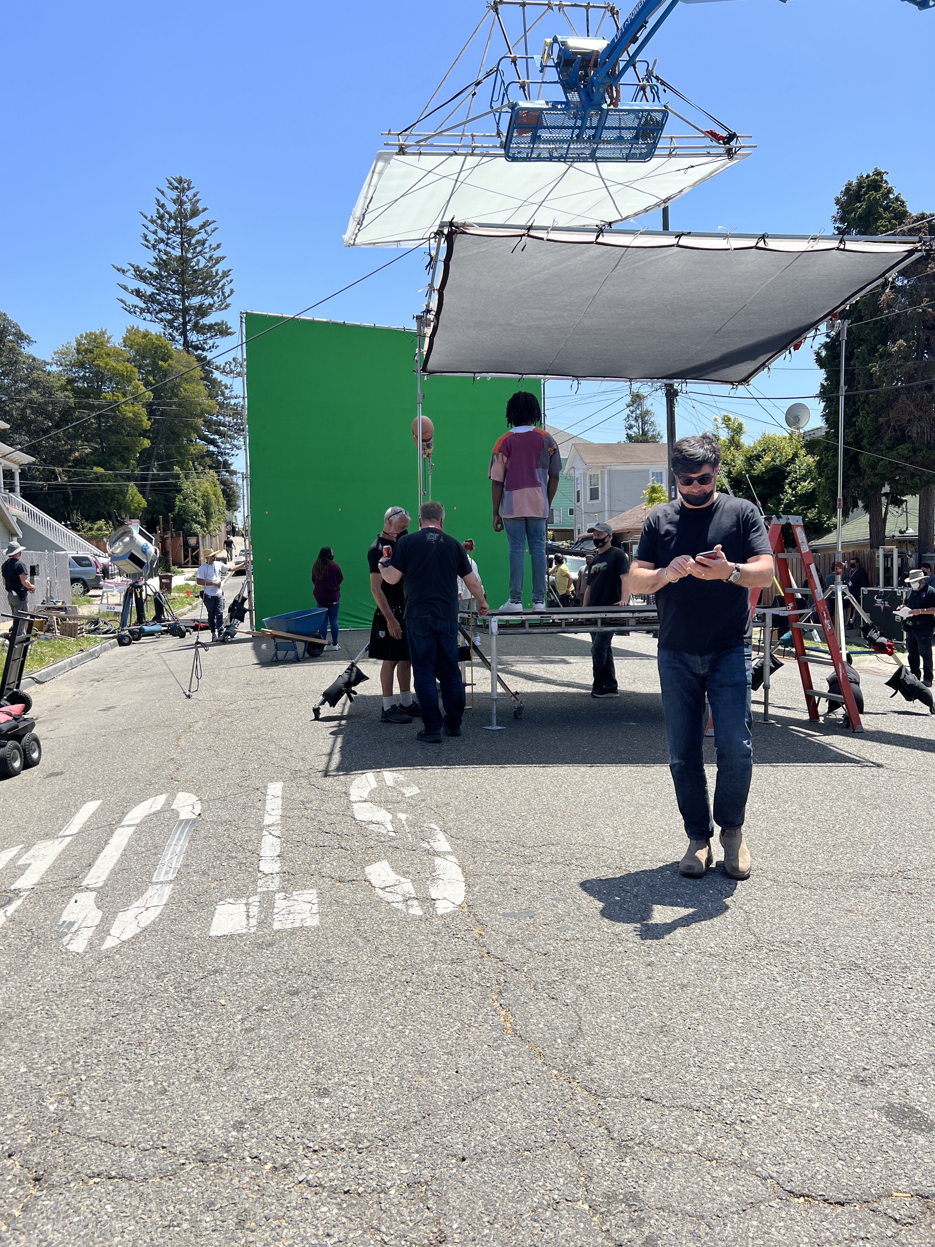 Green screen rigged on Oakland street under silk overhead