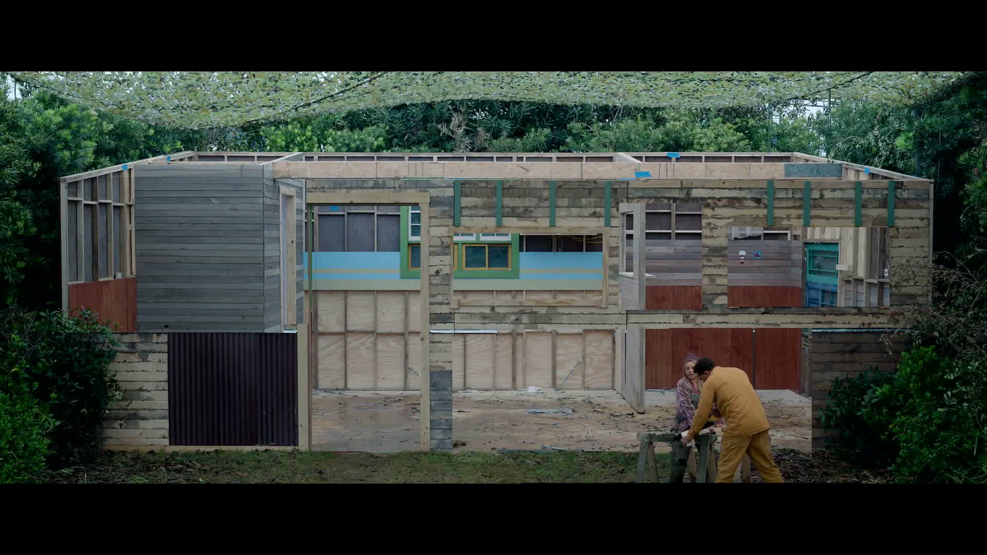 I Am a Virgo — half-built giant-scale house, forced-perspective construction